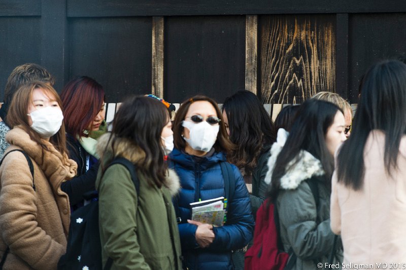 20150313_162456 D3S.jpg - Street scene, Kyoto.  Facial masks for health reasons are worn by some folk